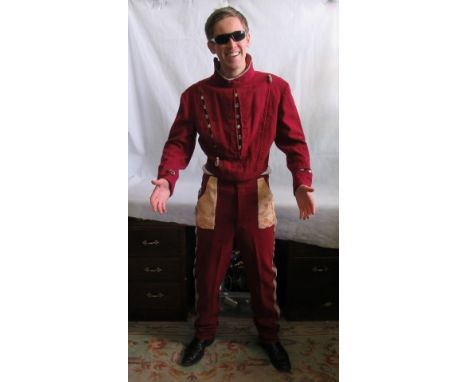 A burgundy two piece Button's costume, hidden zips open to reveal all the buttons for Ball scene, as worn by Bob Monkhouse at