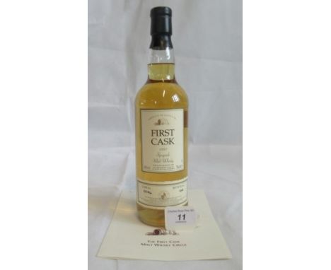 A bottle of 1980 First Cask Glenlivet Speyside Single Malt Scotch Whisky.