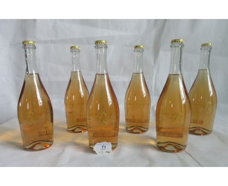 Nine bottles of Petillant De Syrah semi-sparkling wine.