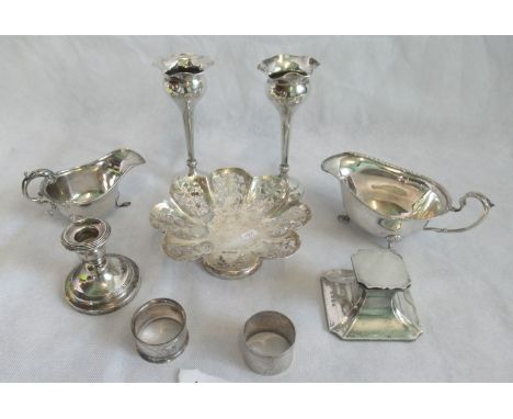 Nine various items of silver, to include: sauce boats, posy vases, candlestick, inkwell, napkin rings and pierced bon bon dis