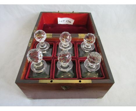 A 19th century mahogany and brass bound campaign six bottle decanter box, complete with six bottles.