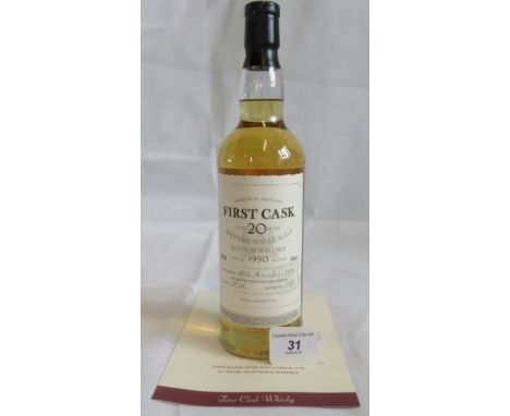 A bottle of 1990 First Cask Glen Elgin Single Malt Scotch Whisky.