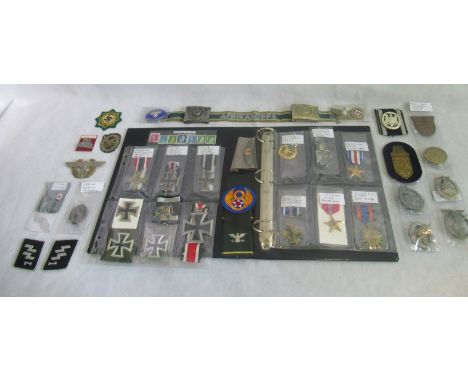 A collection of approximately 40 pieces of German and American military ephemera, to include: WWI and WWII, Iron Cross 2nd Cl