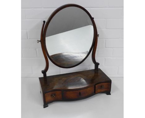 19th century mahogany and chequer string inlaid dressing mirror, with an oval plate and serpentine base with three drawers, o