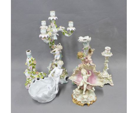 Collection of continental floral encrusted candelabras and a white glazed porcelain planter, (a/f) tallest 40cm (6)