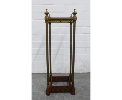 Early 20th century brass stick stand, two divisions, with painted base, 62cm high 