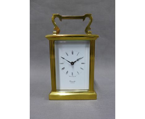 Comitti, London brass and glass panelled carriage clock, 15cm high including handle 