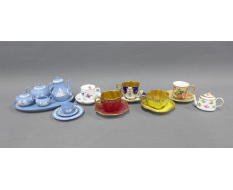 Collection of miniature porcelain cabinet cups and saucers to include Coalport, Royal Worcester Blush Ivory and a Wedgewood J