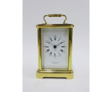 French brass and glass panelled carriage clock retailed by Hamilton &amp; Inches, movement signed Bornand Freres 14cm 