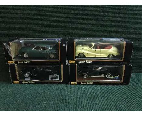 Four boxed Maisto Special Edition large scales die cast vehicles - Jaguar II, BMW 502 etc 