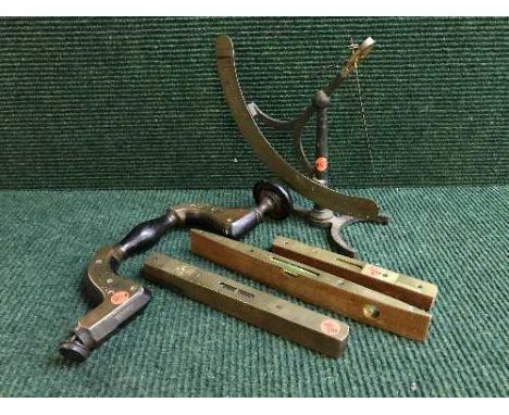 A basket of iron and brass yarn scale, wood and brass Victorian brace, three early twentieth century spirit levels, Salter's 