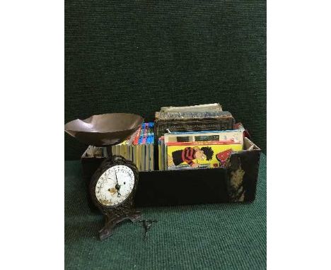 A basket of 78's, family bible, annuals, set of vintage kitchen scales etc 