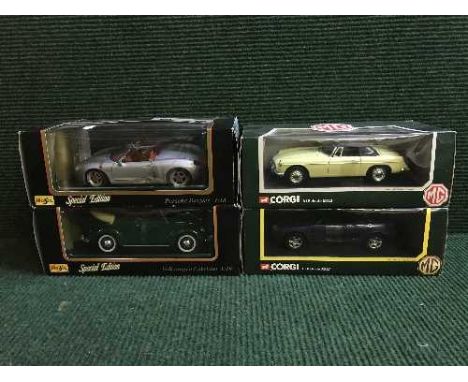 Two boxed Corgi large scale die cast vehicles - 1968 MGB Roadstars and two Maisto Special Editions - Porche Boxster and VW Ca