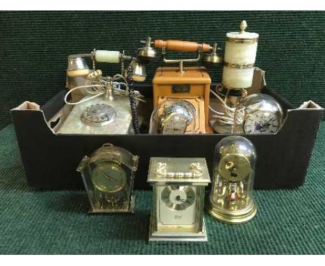 A box of gilt and onyx telephone and table lamp, retro style phone and five various clocks 