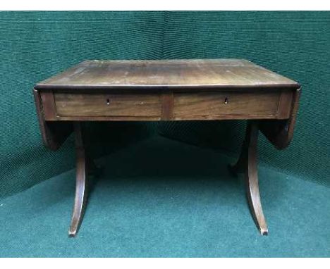 A sofa table fitted two drawers 