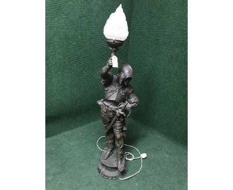 A large spelter floor lamp in the form of a soldier 