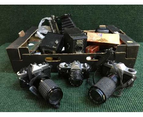 Four boxes of assorted cameras, accessories, camera cases, etc 