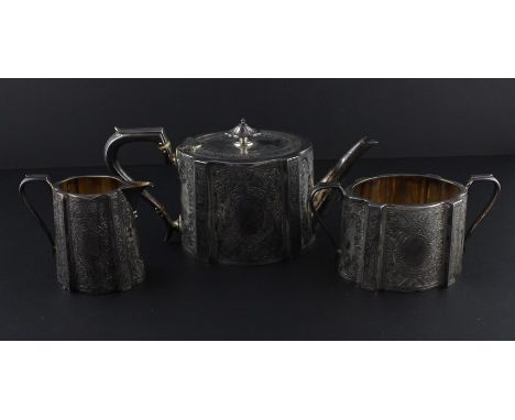 A Victorian three piece silver tea service, by Richard Martin &amp; Ebenezer Hall, assayed London 1887, in the neo-classical 