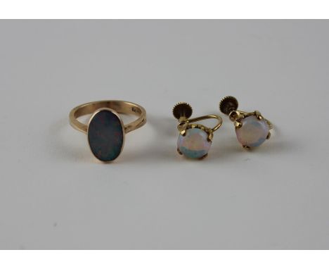 A 9ct. yellow gold and opal ring, set oval cabochon opal to centre, shank impressed "9ct", together with a pair of 9ct. yello