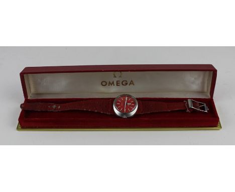 An Omega Dynamic stainless steel ladies' wristwatch, c 1970, having signed red circular dial with raised baton hour markers a