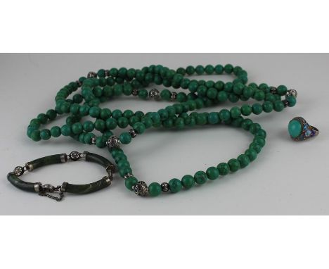 A large turquoise and white metal bead necklace, formed from 10mm diameter green spherical turquoise beads and graduated whit