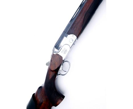 A Beretta 12-bore ASE Gold Trap, single-trigger, over and under, boxlock ejector shotgun.Serial no. AD1470B, 29½in. nitro bar