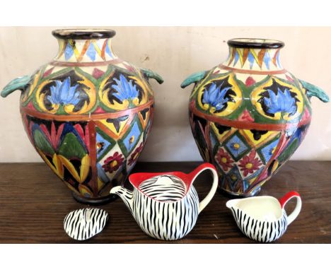 Midwinter Stylecraft teapot and sugar bowl, plus pair of Italian vases.
vases damaged midwinter reasonable