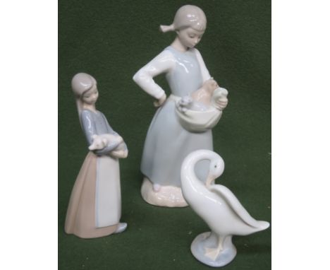 Nao glazed ceramic figure group, plus two Lladro glazed ceramic figure groups
All in reasonable used condition