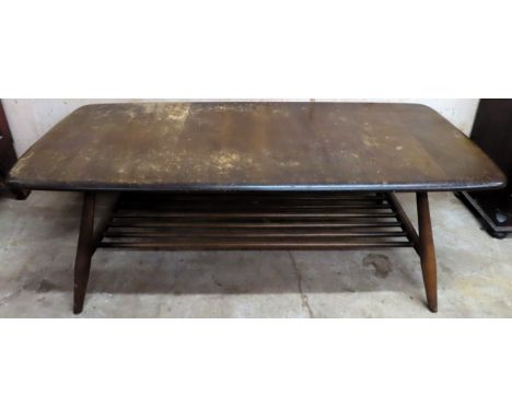 Ercol mid 20th century coffee table. Approx. 36.5 x 105 x 46cms
used condition wear to top legs etc