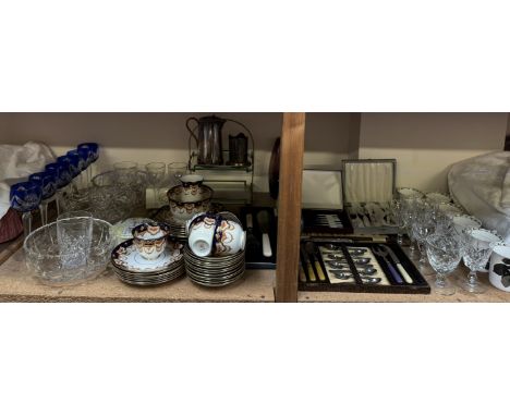 A set of Queen's Fine Bone China mugs together with drinking glasses, cased flatwares, part tea service, blue glass wine glas
