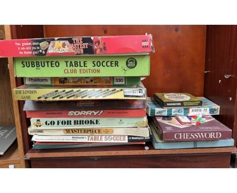 A collection of board games including The Fastest Gun, Sum-It, Chessword, Subbuteo Table Soccer, Sorry, Go For Broke, Masterp