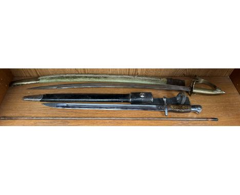 A World War I First World War era British Pattern 1914 Enfield rifle Remington made bayonet. Hooked pommel with push release 