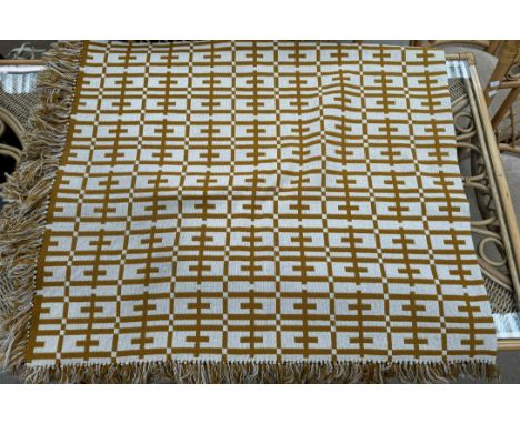 A Welsh Tapestry Bedcover made by Welsh Weavers from 100% Welsh Wool by Wonderwool of Britain in yellow and white geometric p