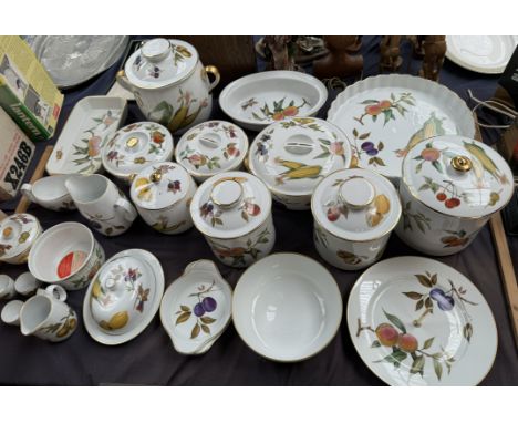 A Royal Worcester porcelain part dinner set including storage jars and covers, tureens etc 