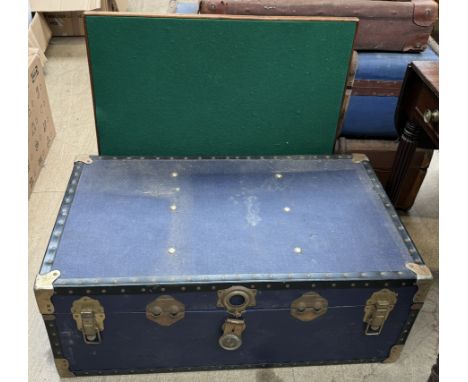 A trunk together with a folding card table 