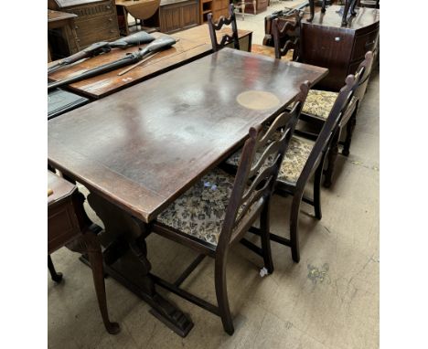 A 20th century oak refectory table together with a set of four ladder back dining chairs
