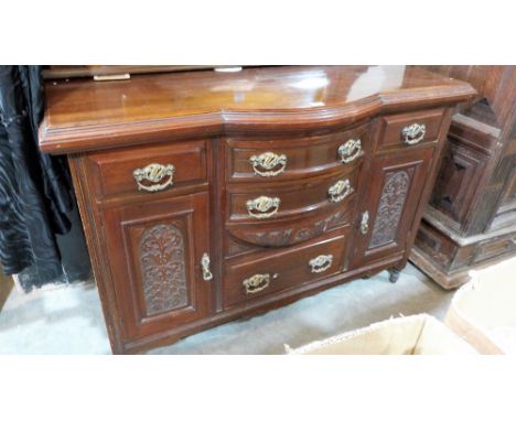 A Victorian walnut bow breakfront sideboard. 54'' wide