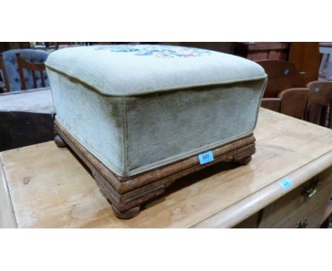 A Victorian tapestry footstool