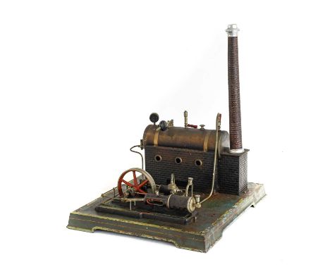 Doll &amp; Cie Live Steam Stationary Engine  with horizontal boiler mounted on brick effect base powering single cylinder hor
