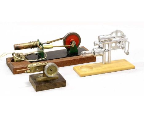 Hor Air Engines a modern aluminium example together with a brass example on wooden base; together with a small single cylinde