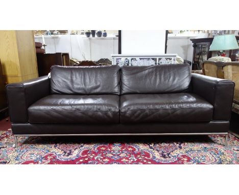 A contemporary brown leather sofa