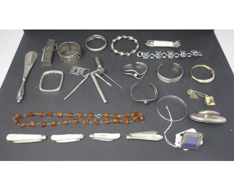 A mixed collection of silver and silver plated items, to include silver bangles, containers, silver and mother of pearl knive