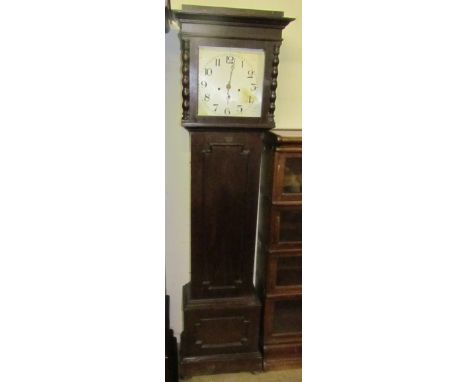 A 20th century oak cased long case clock, with a silvered dial and long trunk door