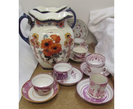A pair of Marigold pattern jugs, produced for Harrods together with pink lustre tea cups and saucers etc