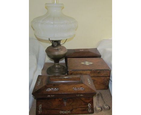 A Victorian rosewood and mother of pearl inlaid sarcophagus shaped box together with another rosewood box and cover, a walnut