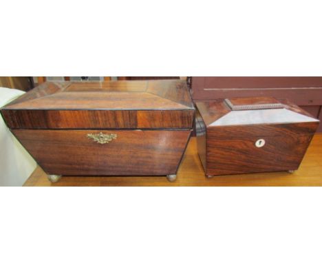 A Victorian rosewood sarcophagus tea caddy together with another sarcophagus shaped box
