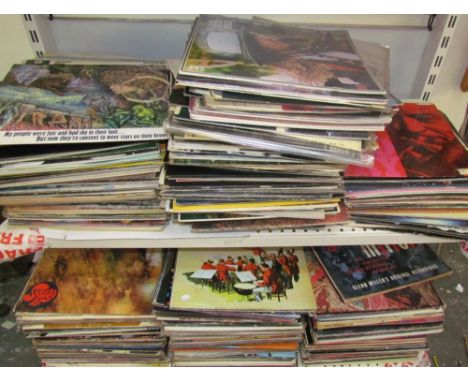 A large collection of LP's including The Beatles, David Bowie, Shirley Bassey, Bob Dylan, etc