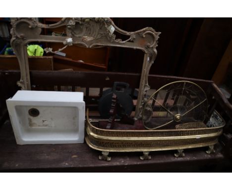 A brass fire guard together with a brass fan fire screen, a porcelain sink, picture frame, bake stones and a mahogany shelf