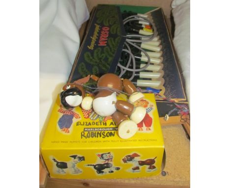 A Pelham Puppet Bengo, boxed together with Osram Christmas lights