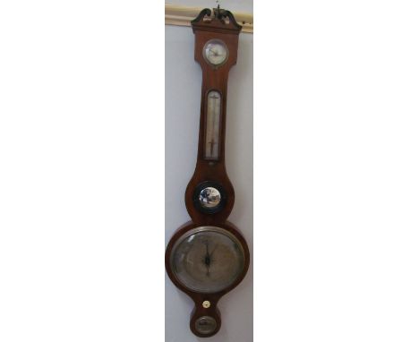 A George III mahogany banjo barometer with a broken swan neck pediment above a hydrometer, alcohol thermometer, butler's mirr